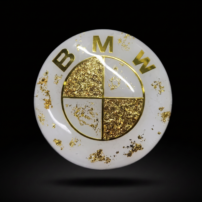 Ivory Gold forged badge — pearl white with 24k gold leaf by REVMODE