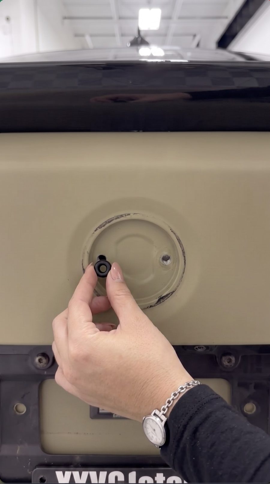 Removing the rubber grommets from the badge pin holes